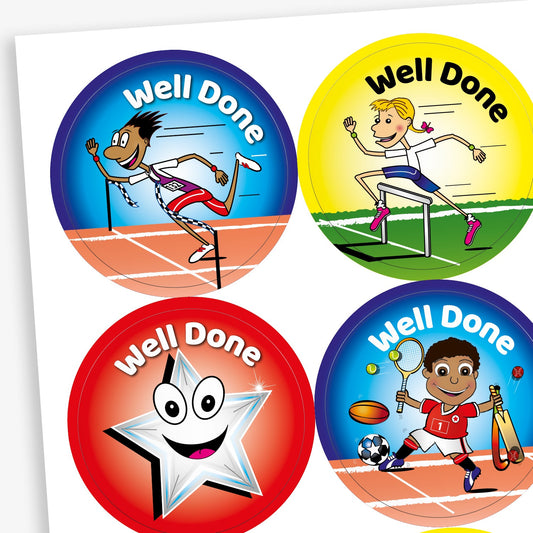 Sheet of circular stickers with bright coloured backgrounds all saying 'Well Done'.  A blue background has an athlete crossing the finish line, the yellow background shows a character hurdling, a red background with a silver smiling star and a blue background with a boy character holding sporting equipment.