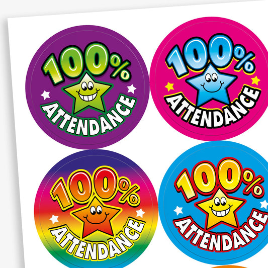 A sheet of circular reward stickers celebrating 100% attendance. Each sticker features the text '100% Attendance' in bold, colourful letters with a smiling star character in the centre. Background colours vary, including purple, pink, rainbow gradient, and blue, making the stickers bright and engaging.