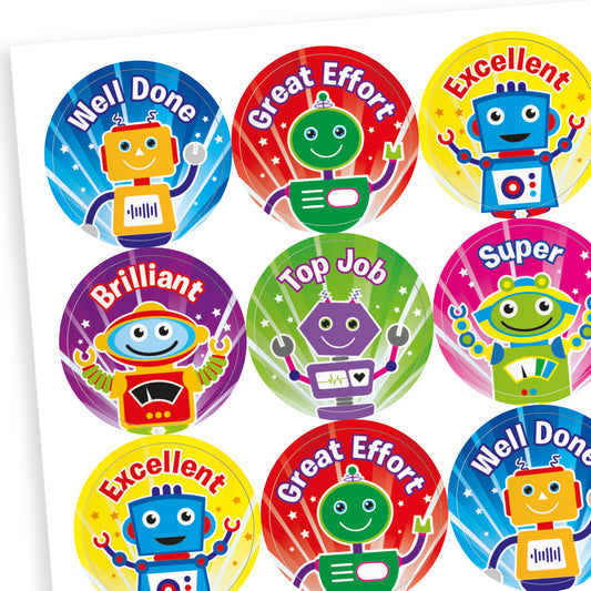 A sheet of 25mm circular stickers with tropical fruit scent.  Featuring colourful robots, each accompanied by motivational phrases such as 'Well Done' and 'Great Effort' and 'Excellent'.