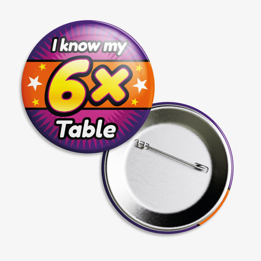 A 38mm circular badge with a vibrant orange and purple background, featuring the bold white text 'I know my' above a large yellow '6x' and the word 'Table' below, accented by white stars on either side.