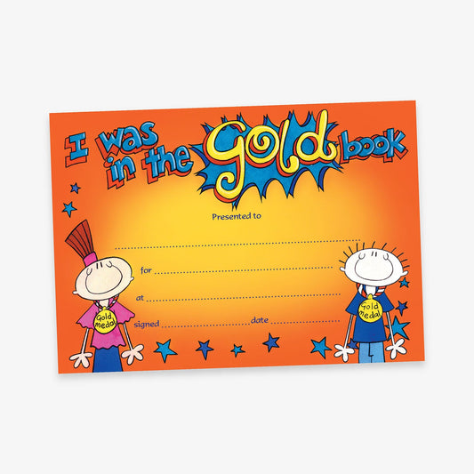 A brightly coloured certificate with an orange background and playful cartoon design. The heading reads 'I was in the Gold Book' in large, bold, and stylised lettering, with the word 'Gold' highlighted in yellow and outlined in blue. Two cartoon children wearing 'Gold Book' shirts are shown on either side. There are blank lines for 'Presented to', 'for', 'at', 'signed', and 'date', surrounded by stars in blue, red, and yellow.