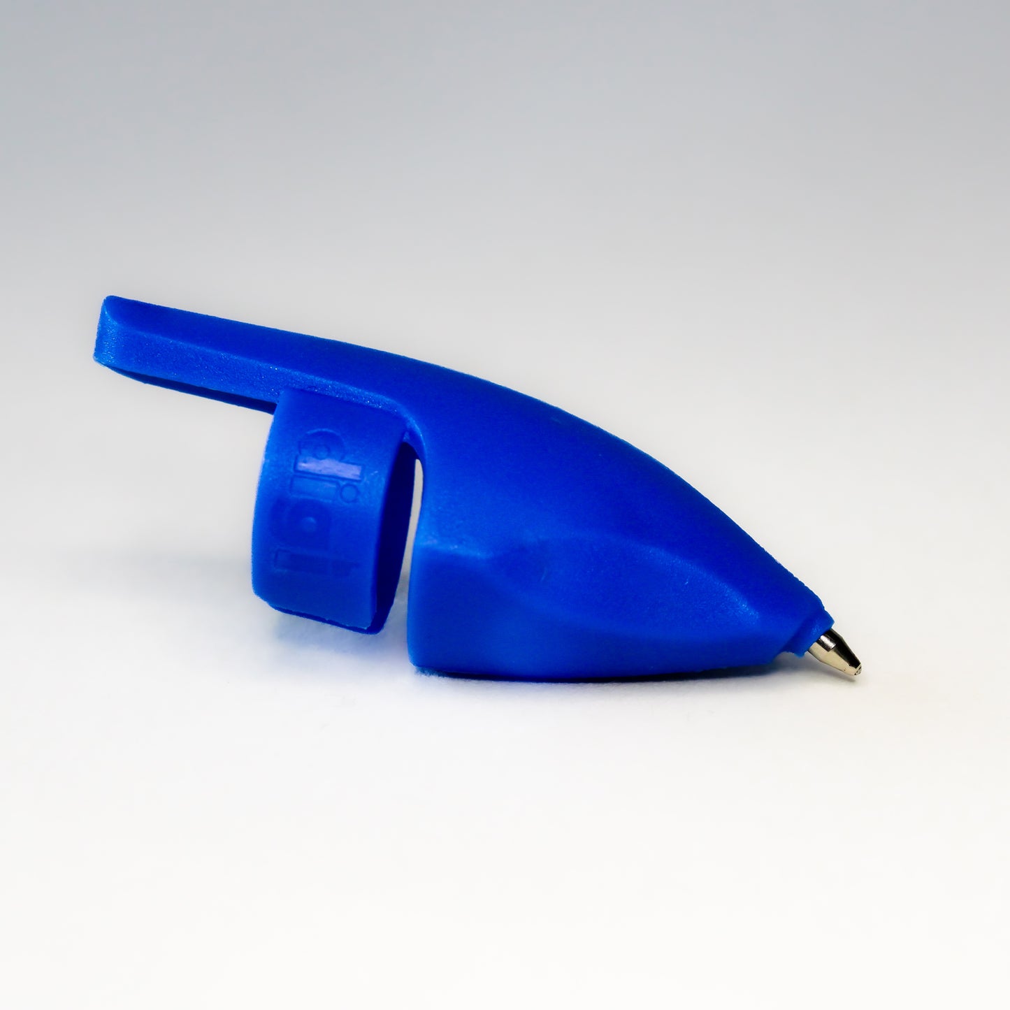 A blue plastic finger pen, designed to give almost direct contact with paper when writing.