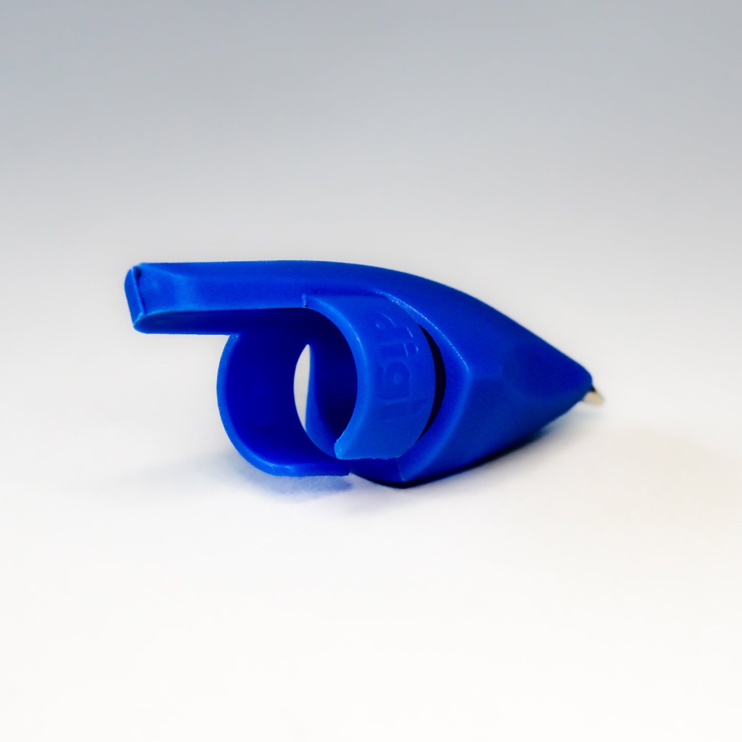 A blue plastic finger pen, designed to give almost direct contact with paper when writing.