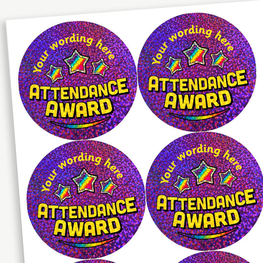 Sheet of holographic, circular purple stickers with 'ATTENDANCE AWARD' central to the design in gold and 3 rainbow coloured stars above.  Placeholder text above the image 'Your wording here' shows customisation options.