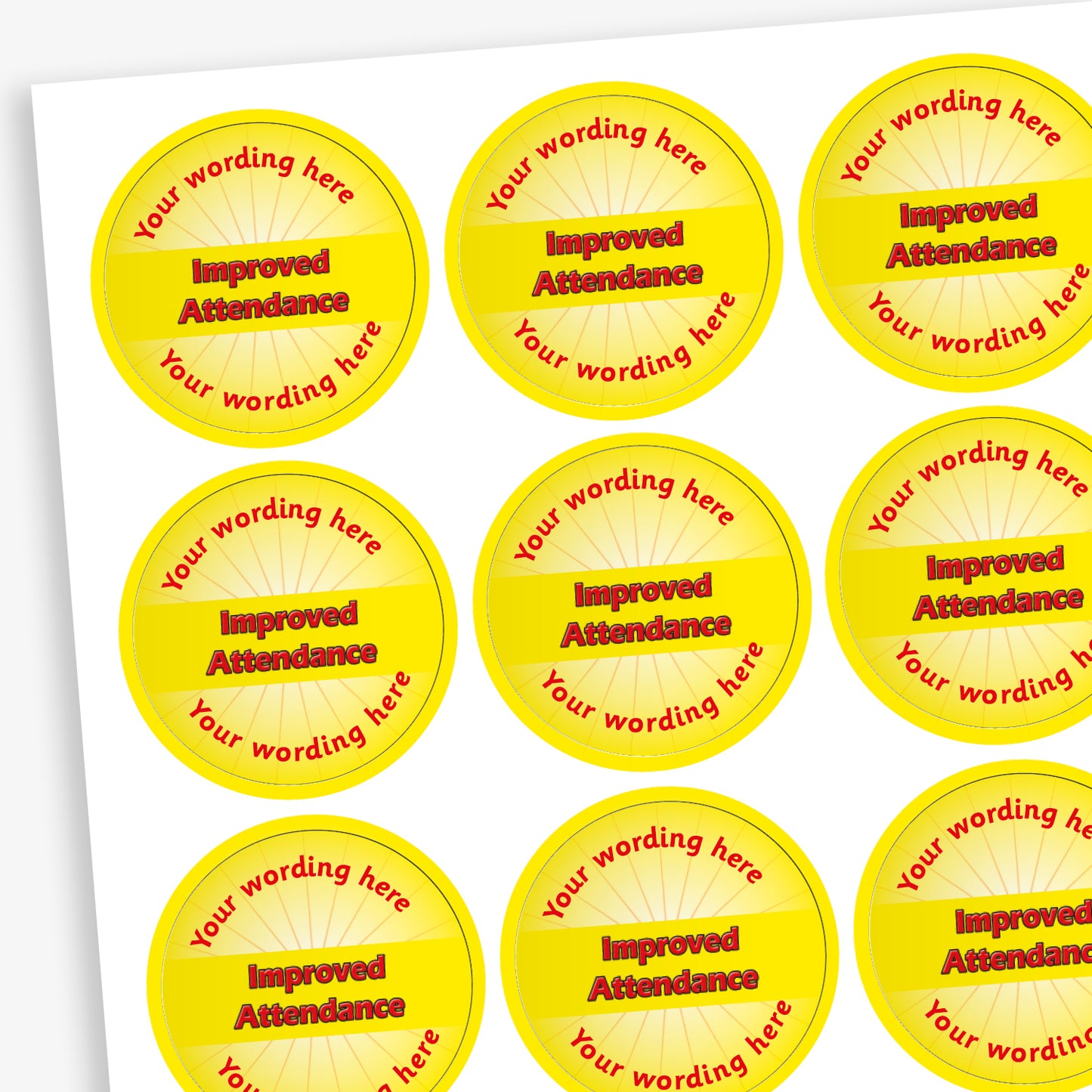 Sheet of 70 personalised 'Improved Attendance' stickers, each 25mm in diameter, featuring a yellow circular design with the text 'Improved Attendance' in bold red letters and space for custom wording above and below, ideal for recognising pupils' attendance improvements.