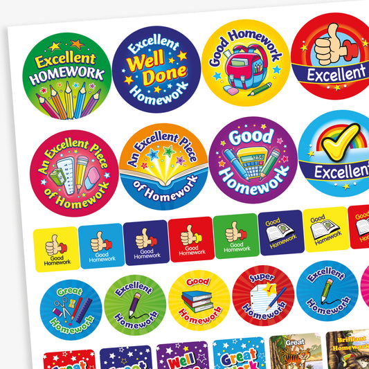 A variety of colourful reward stickers focused on homework achievement. Phrases include 'Excellent Homework', 'Well Done', 'Good Homework', and 'An Excellent Piece of Homework'. The designs feature vibrant graphics such as pencils, books, stars, thumbs-up icons, and school bags. Stickers are in round and rectangular shapes with bold text and playful backgrounds, intended to encourage and celebrate pupils’ homework efforts.