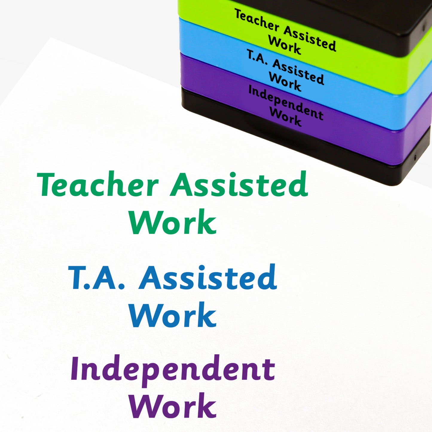 3 stacked rectangular self-inking stampers measuring 44mm by 13mm, featuring the imprint - 'Teacher Assisted Work' in green ink; 'T.A. Assisted Work' in blue ink; 'Independent Work' in purple ink
