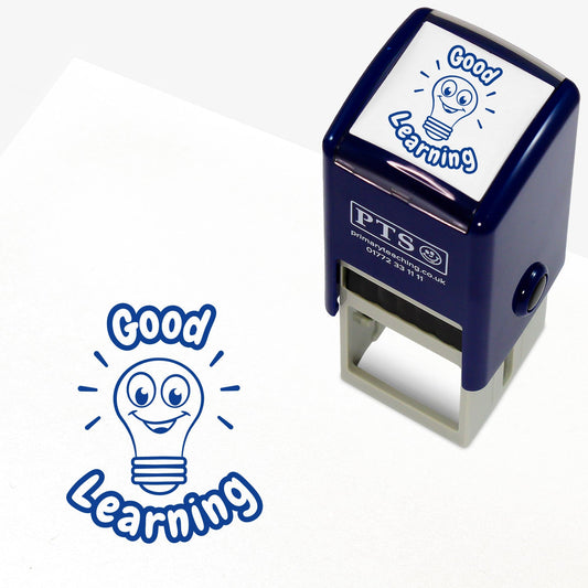 25mm self-inking stamper with blue ink.  The stamp impression shows a central image of a smiling lightbulb with 'Good' above, and 'Learning' below the image.