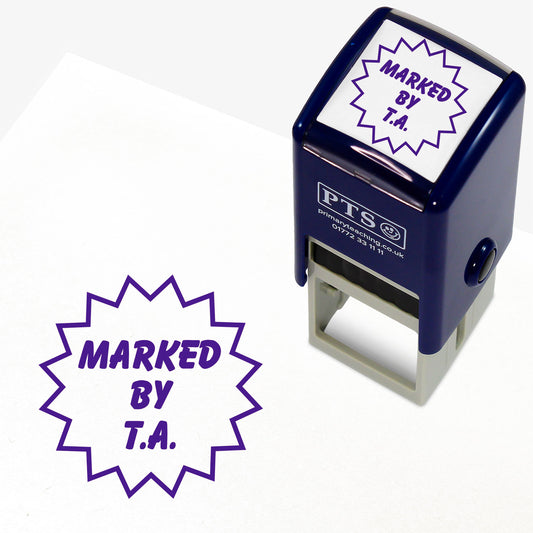 A 25mm self inking stamper with purple ink with the phrase 'MARKED BY T.A.' within a flash