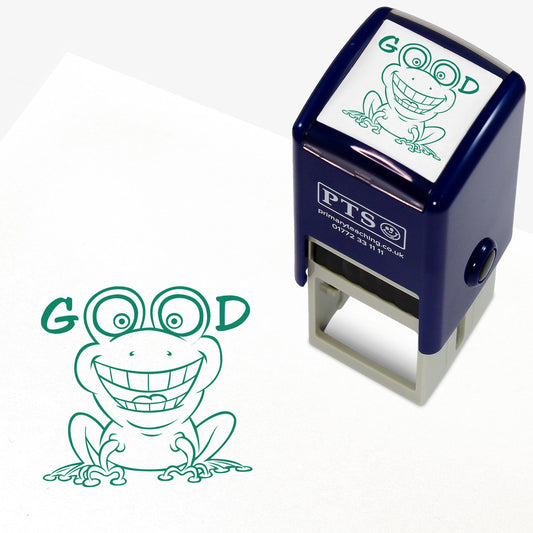 Square 25mm stamper with green ink, featuring the central image of a cartoon smiling frog with the letters 'G' and 'D' either side of it's eyes to spell the word 'GOOD'.