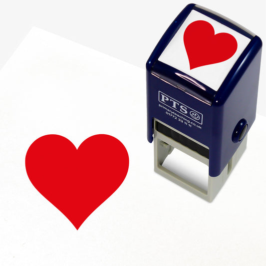 A 25mm round pre-inked stamper with red ink, featuring an imprint of a solid red heart.