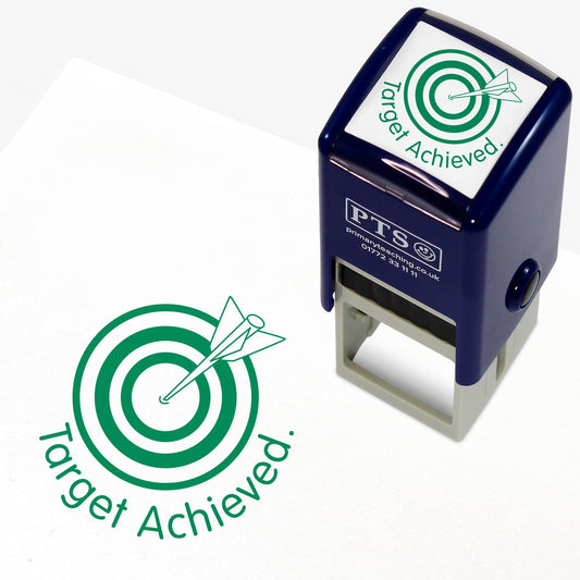 Green ink 25mm pre-inked stamper featuring an arrow hitting a bullseye in a target with the phrase 'Target Achieved' underneath.