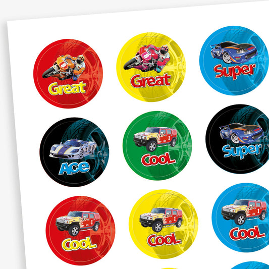 A sheet of circular reward stickers featuring various colourful vehicles, including motorcycles, sports cars, and trucks. Each sticker has a bright background—red, yellow, blue, green, or black—and includes positive words like 'Great', 'Super', 'Cool', and 'Ace' in bold, playful text. Designed to appeal to vehicle enthusiasts and motivate pupils.