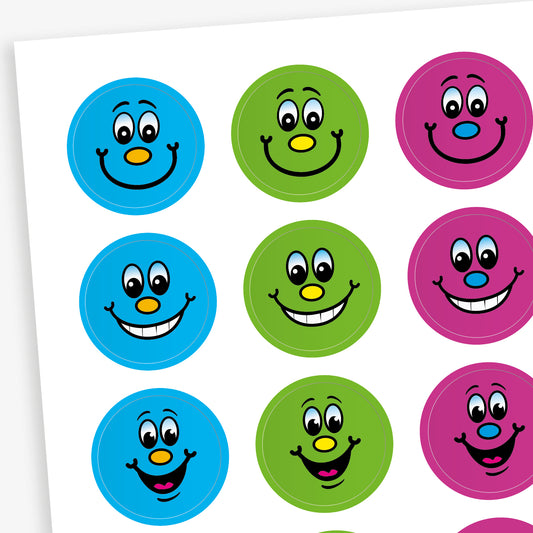 Sheet of stickers with various cartoon smiling faces on backgrounds of blue, green, pink, red and yellow