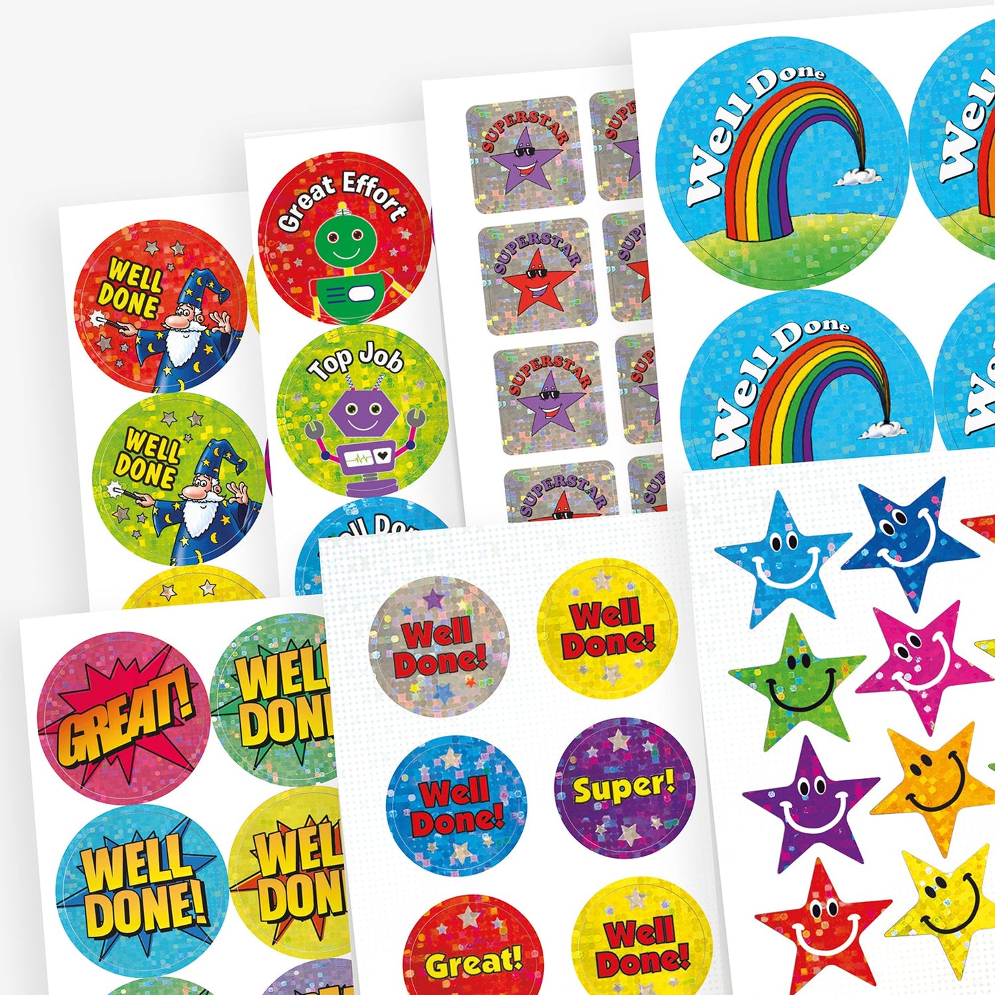 Selection of holographic stickers including ith phrases including 'Well Done' against a comic style burst, or arcing over a rainbow; smiling star shaped stickers; and wizard in robes casting a spell saying 'Well Done'.
