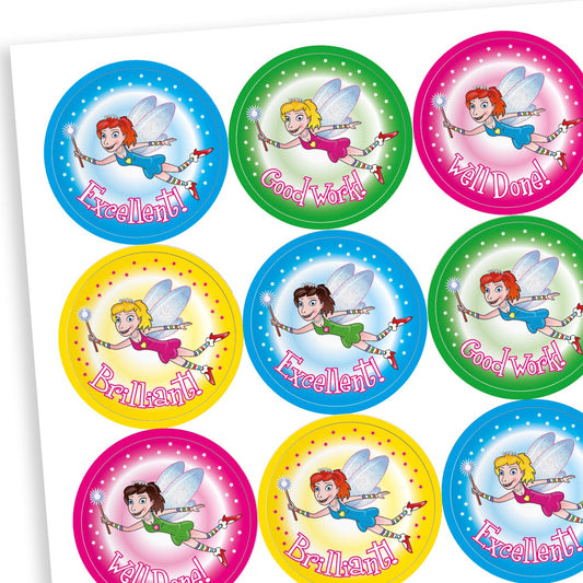 Sheet of bright coloured reward stickers in cyan, magenta, green and yellow, featuring a a range of flying fairies with a wand. Messages include 'Well Done', 'Brilliant', 'Good Work' and 'Excellent'.