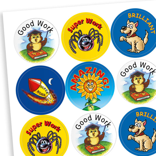 Sheet of circular reward stickers featuring a variety of fun characters including a mortarboard wearing owl on a book, a smiling spider, sunflower, rocket and dog with it's paw raised. Messages include 'Brilliant', 'Amazing', 'Good Work' and 'Super Work'.