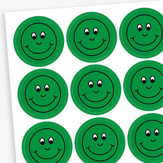 A sheet of circular, green reward stickers featuring a black outline of a smiling face.