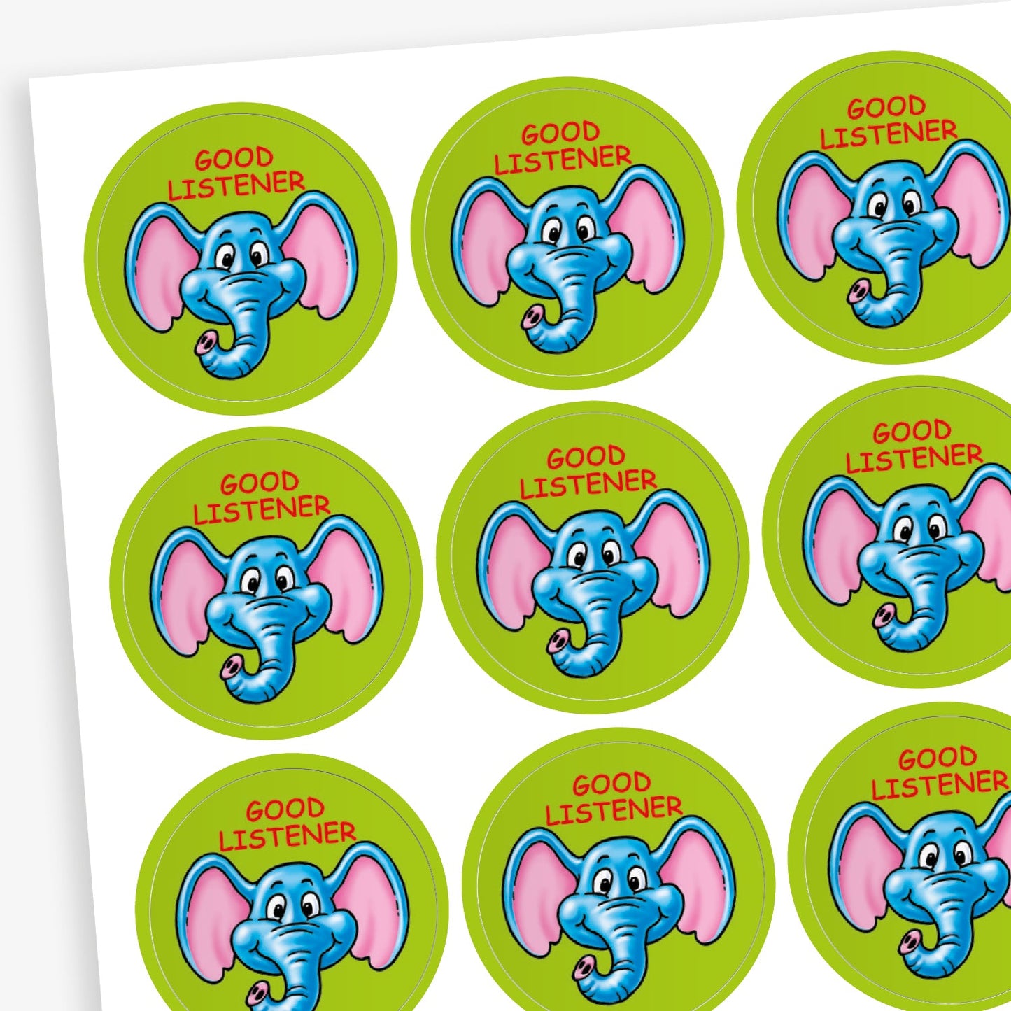 A sheet of circular reward stickers featuring a green background with a cartoon elephants head in the centre. Each sticker includes the text 'Good Listener' above the image.