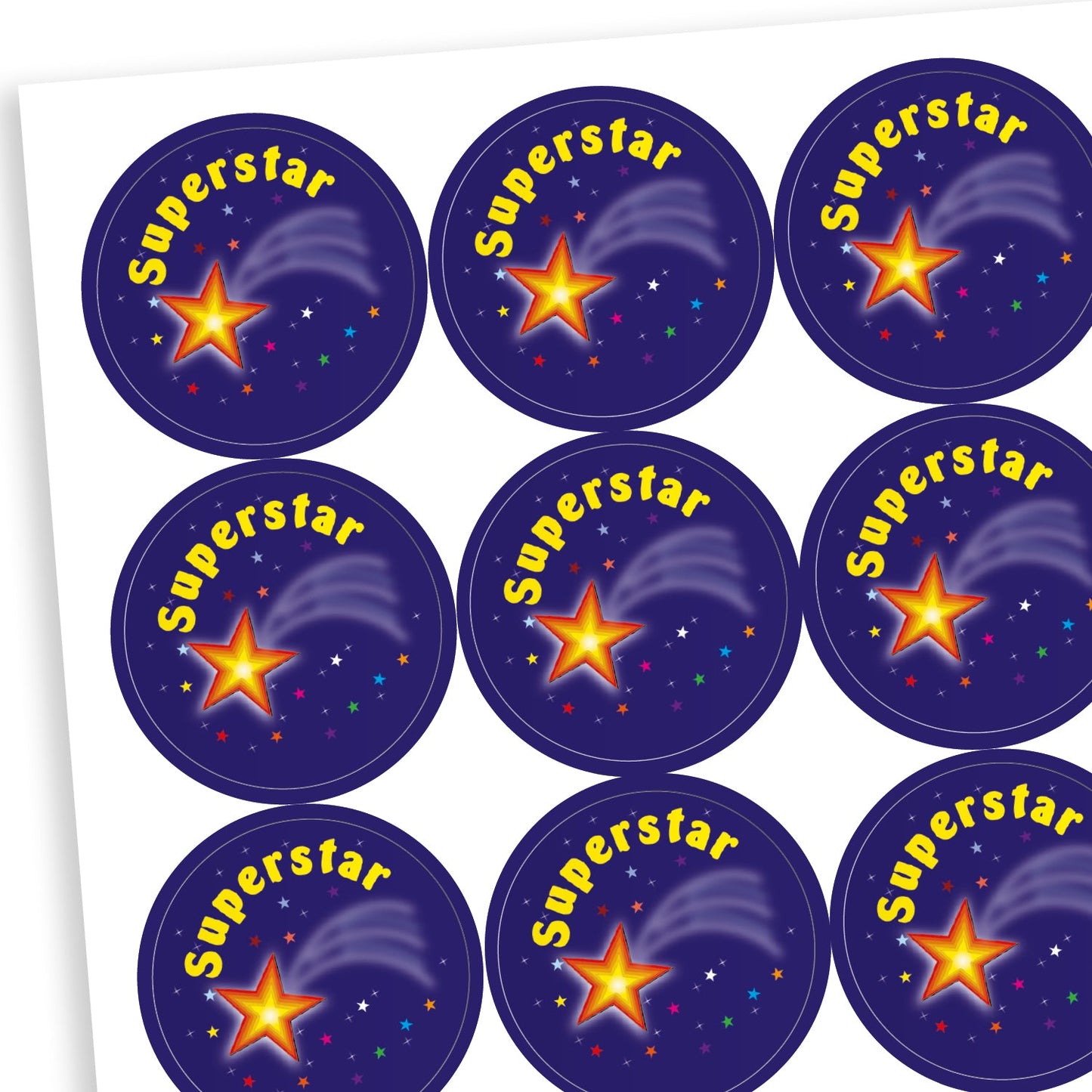 A sheet of circular, purple reward stickers featuring shooting star amongst a background of tiny stars. The stickers has 'Superstar' arcing in yellow text above the star.