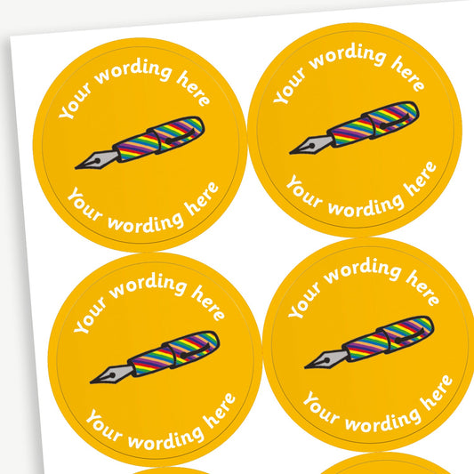 A sheet of yellow stickers featuring an illustration of a rainbow coloured fountain pen in the centre.  Placeholder text 'Your wording here' is above and below the image for customisation.