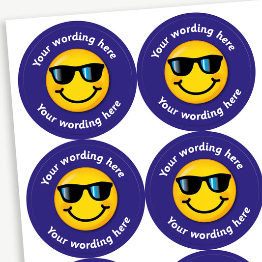 Sheet of 37mm round personalised stickers featuring a smiling emoji wearing sunglasses on a bright background, with customisable text above and below the emoji; designed for rewarding pupils' achievements.