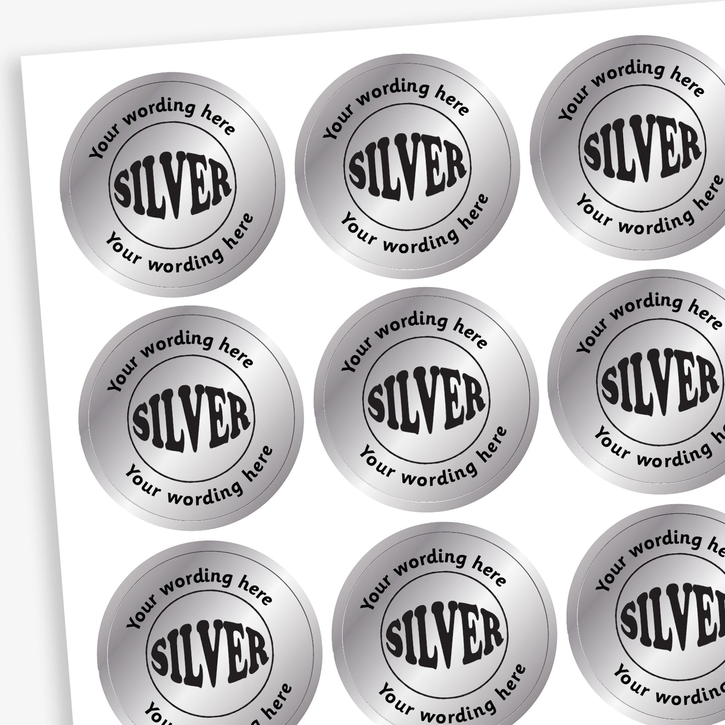 Sheet of 70 personalised 25mm circular stickers with a metallic silver finish; each sticker features a bold 'SILVER' in the centre, surrounded by the customisable text 'Your wording here' above and below, designed to reward pupils for achieving second place.