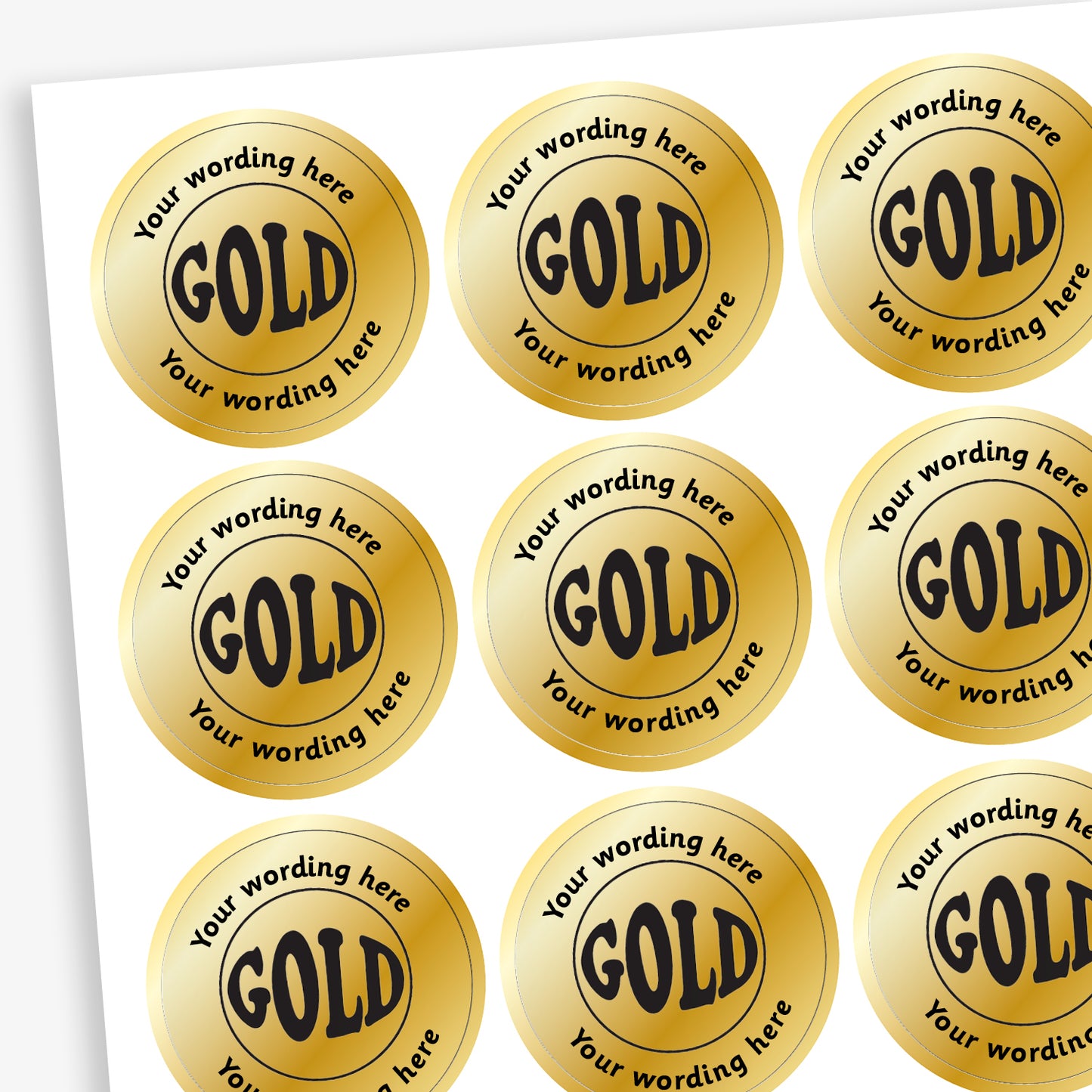 Sheet of 35 round 37mm metallic gold stickers featuring the word 'GOLD' in bold black uppercase letters, with customisable text above and below; ideal for rewarding pupils' achievements.