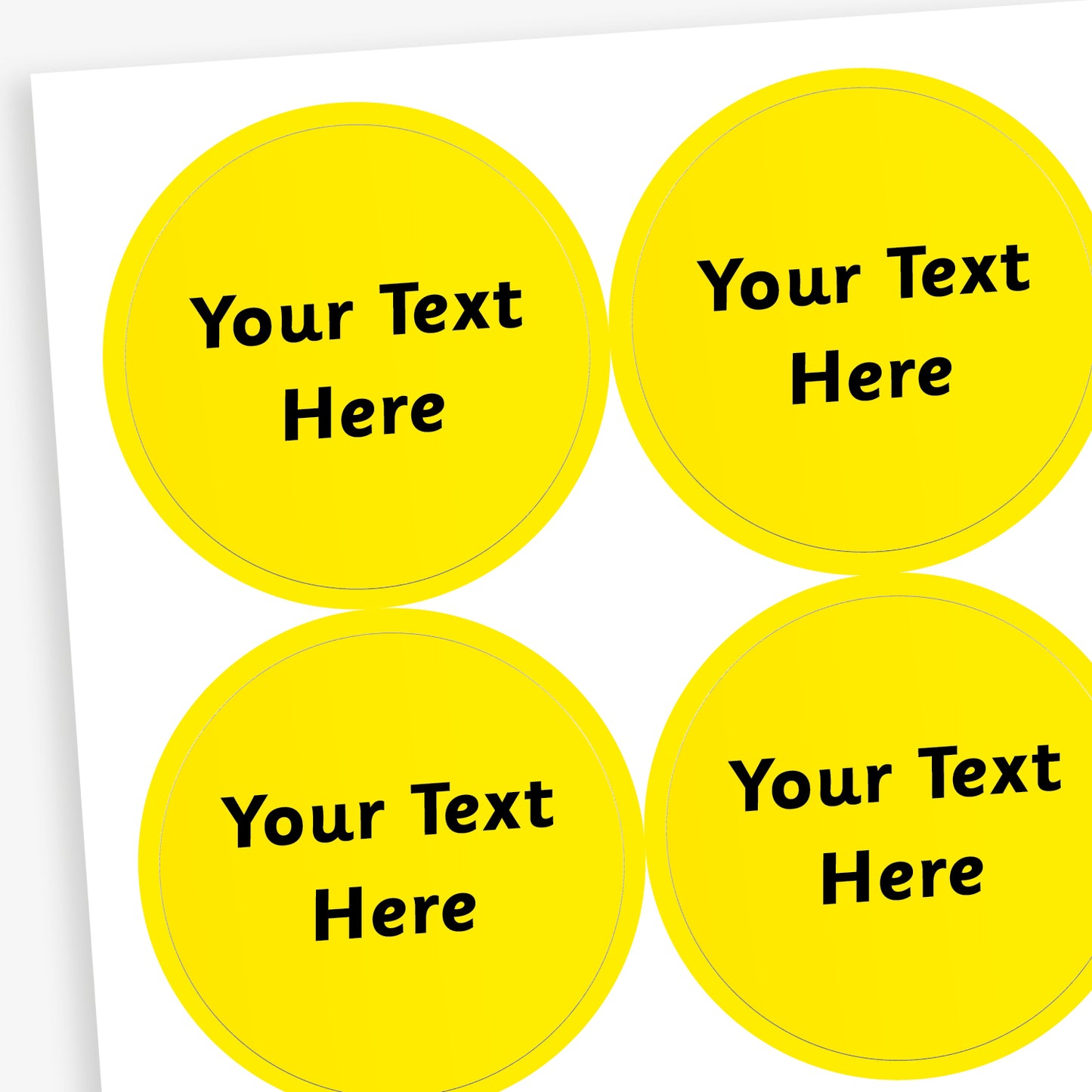 A sheet of yellow circular stickers featuring placeholder space for personalisation 'Your Text Here' in a clear, bold font central to the sticker.