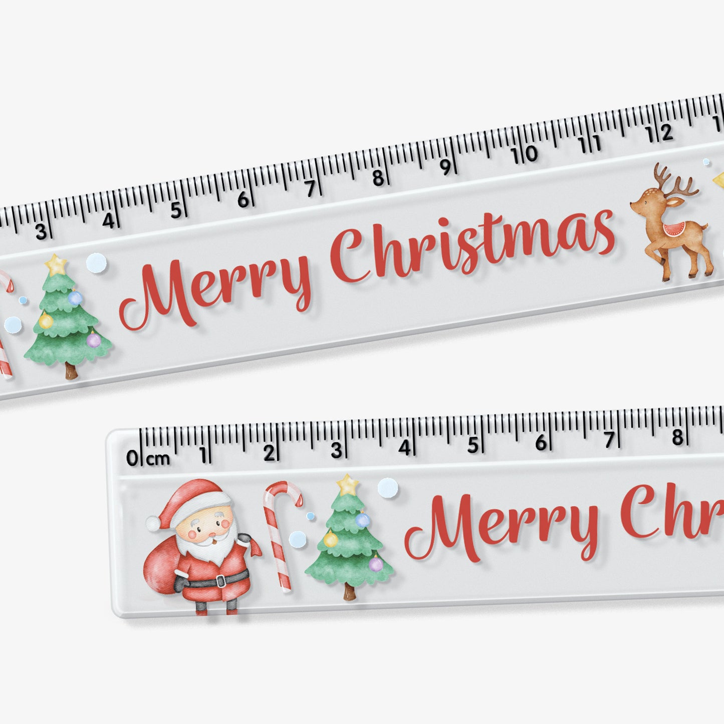 A close up of a transparent 15cm ruler featuring the phrase 'Merry Christmas' in bold red script, decorated with classical festive characters: Father Christmas, Christmas tree, Reindeer, Snowman, candy cane and star.