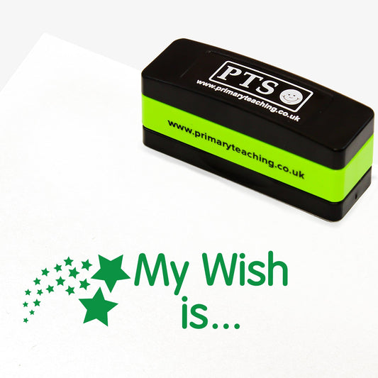 Rectangular self-inking stamper measuring 44mm by 13mm, featuring, across two lines, the phrase 'My Wish is….' with a shower of stars to the left- all in green ink.