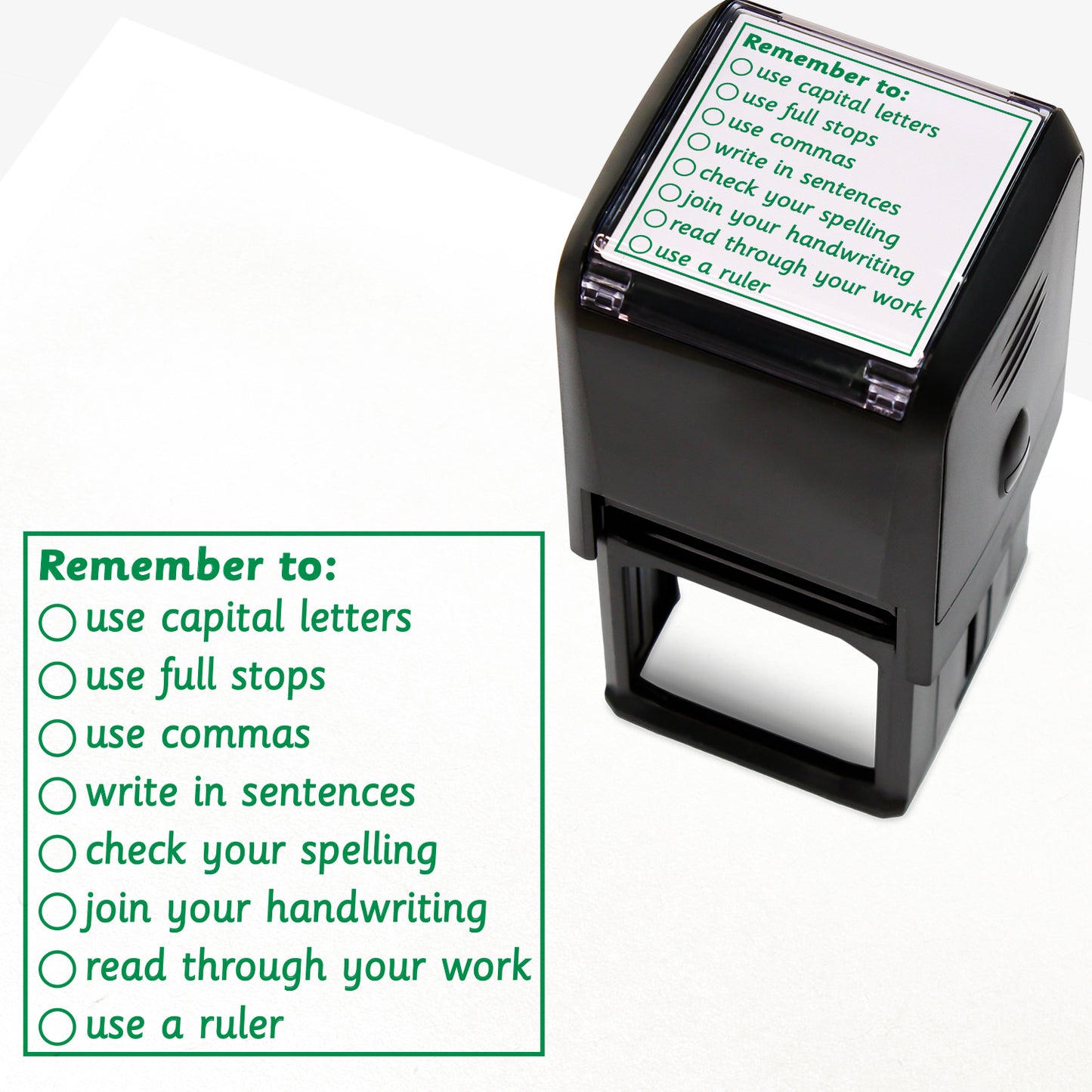 Green ink 40mm square self-inking teacher stamp with a checklist titled 'Remember to:' followed by tick-box items: use capital letters, use full stops, use commas, write in sentences, check your spelling, join your handwriting, read through your work, and use a ruler.