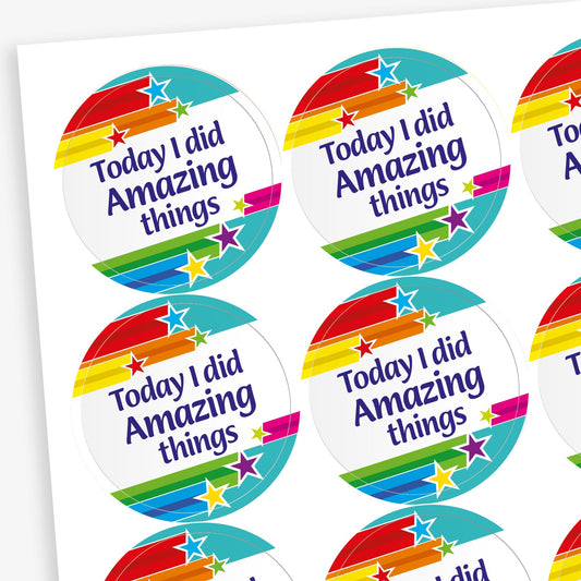 Sheet of vibrant round stickers with rainbow stripes and stars, displaying the message 'Today I did Amazing things'