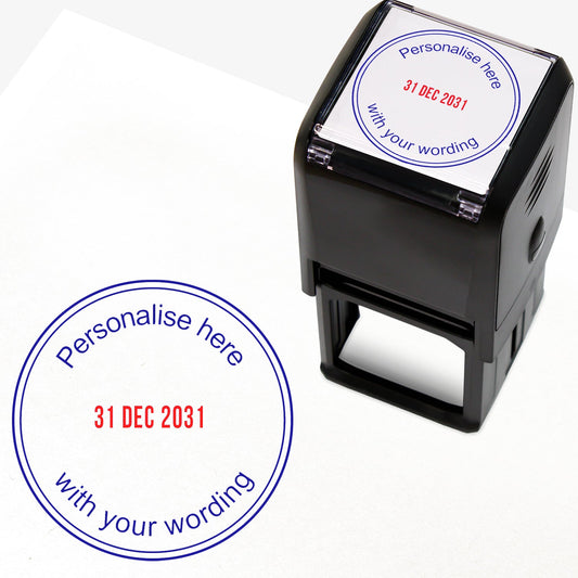 A self-inking stamp with blue and red ink. The impression within a blue circle includes the date '31 DEC 2031' in the centre in red ink, with the blue text 'Personalise here' curved along the top edge and 'with your wording' along the bottom edge of the circle.