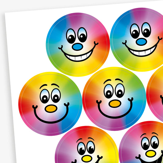A sheet of 32mm circular stickers with berry scent.  Featuring a smiling face on a rainbow spectrum background.