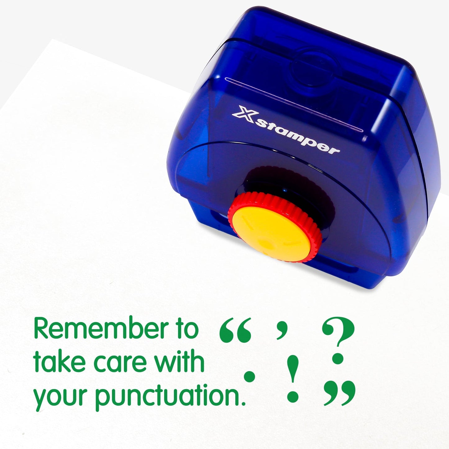 One Twist N Stamp brick in green ink. The phrase 'Remember to take care with your punctuation' is alongside many punctuation symbols