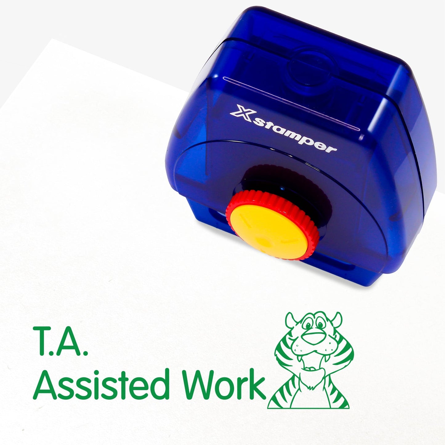 One Twist N Stamp brick in green ink with a cartoon tiger face and phrase saying 'T. A. Assisted Work'.