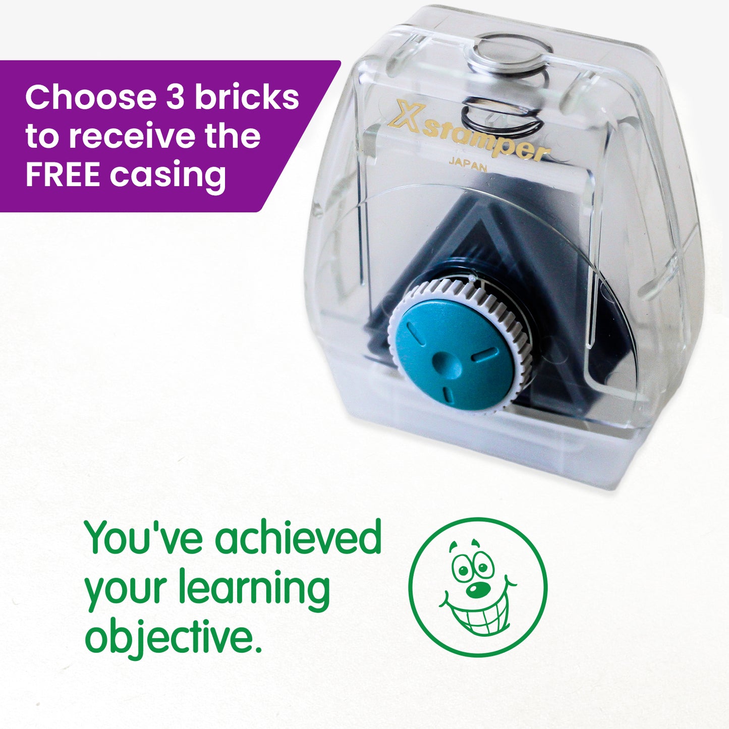 One Twist N Stamp brick in green ink.  A smiling face alongside the phrase 'You've achieved your learning objective'