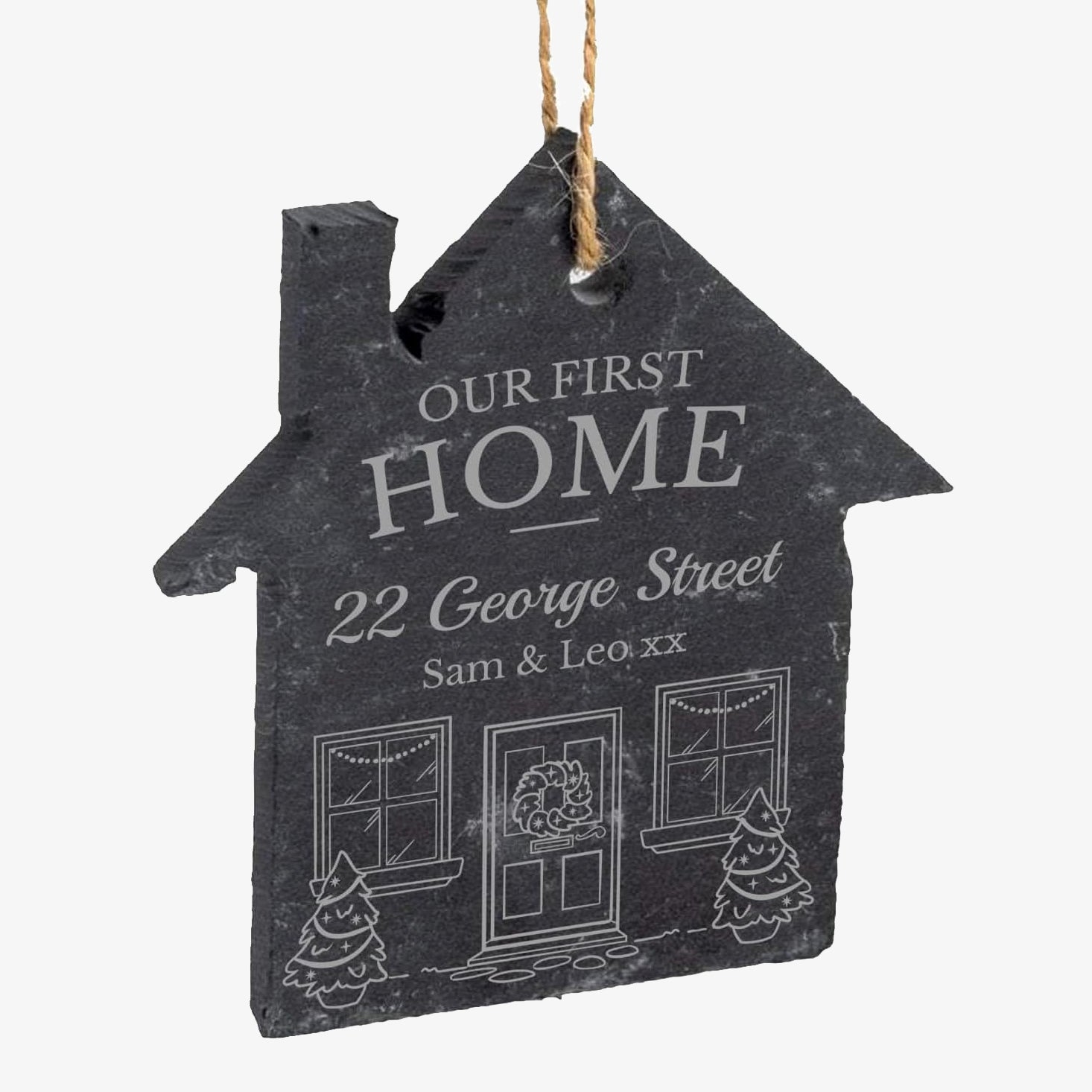 House-shaped slate plaque with 'Our First Home' text and personalisation on a white background