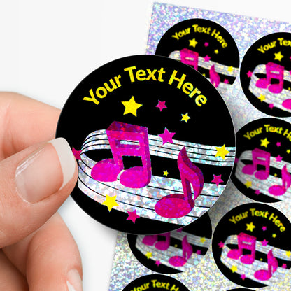 Personalizable music-themed stickers with a hand holding one, on a white background.