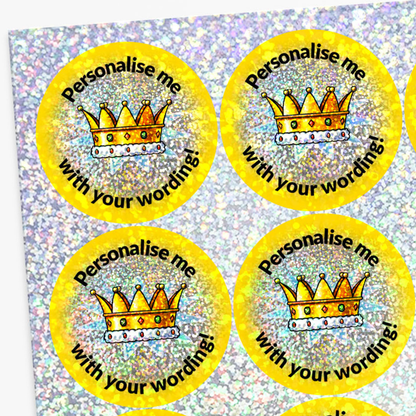 Yellow stickers with crowns and text on a glittery background