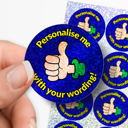 Stickers with thumbs up icons and text on a blue background held in between fingers
