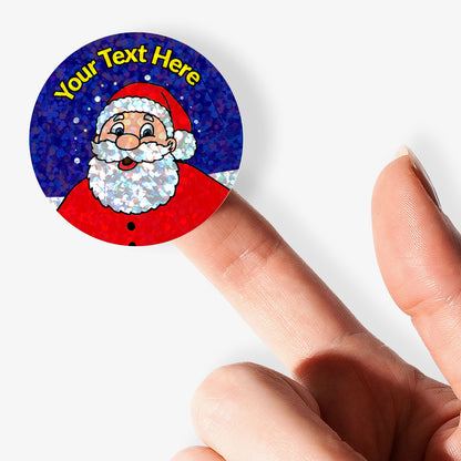 Round sticker with Santa Claus design on a finger, text 'Your Text Here' above.