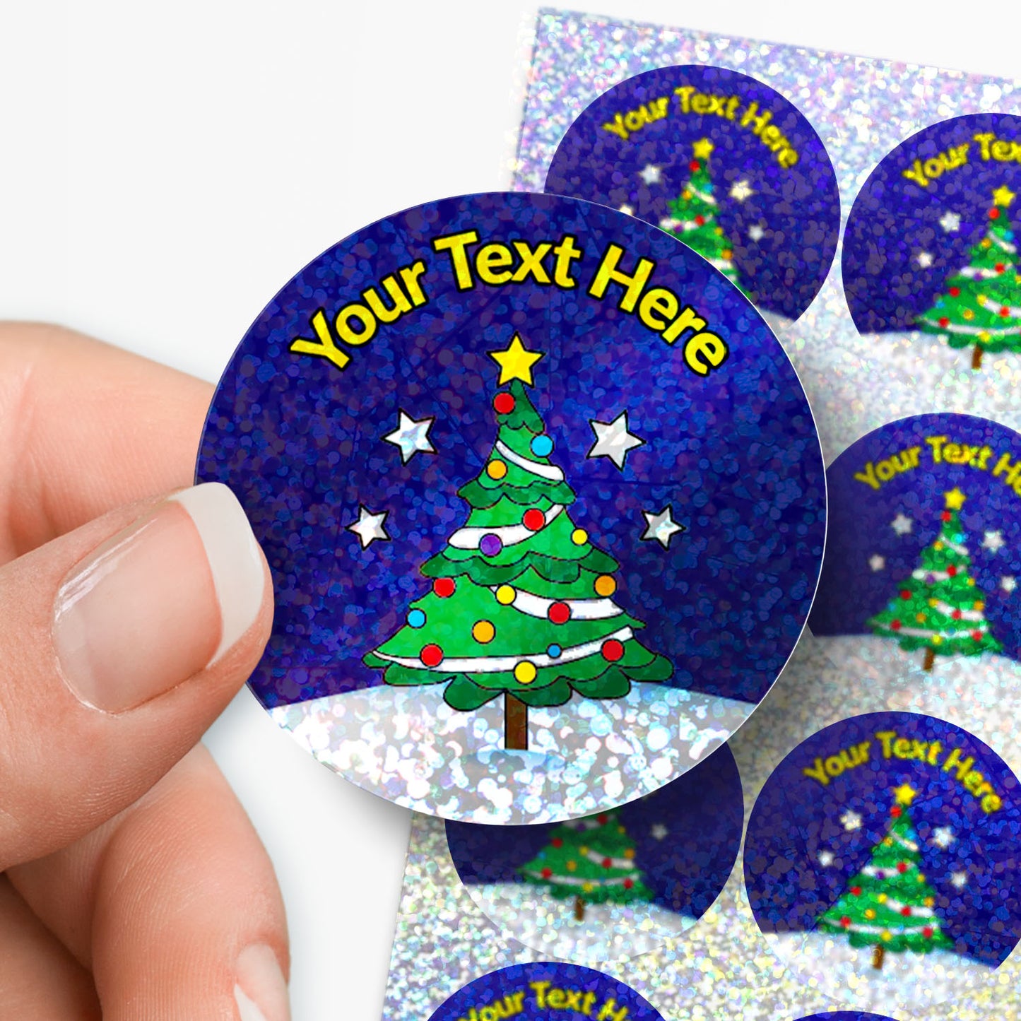 Personalisable Christmas tree stickers with customizable text on a blue background.