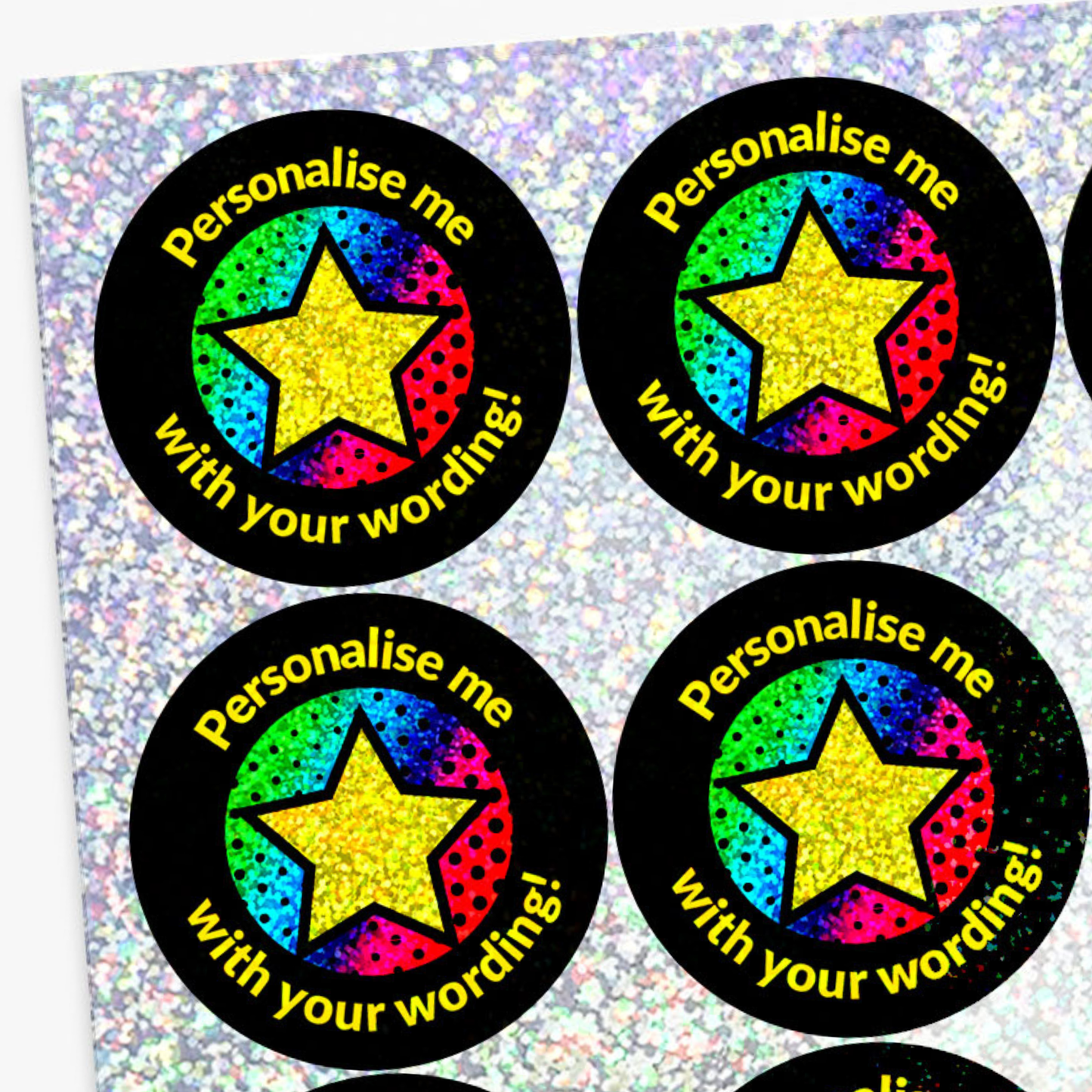 Four round stickers with colorful stars and text on a glittery background