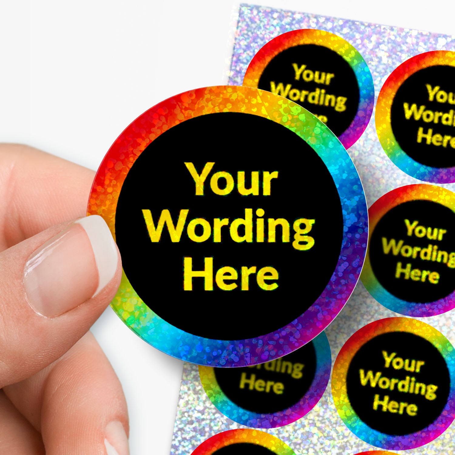 Personalised holographic round stickers with 'Your Wording Here' text, held by a hand.