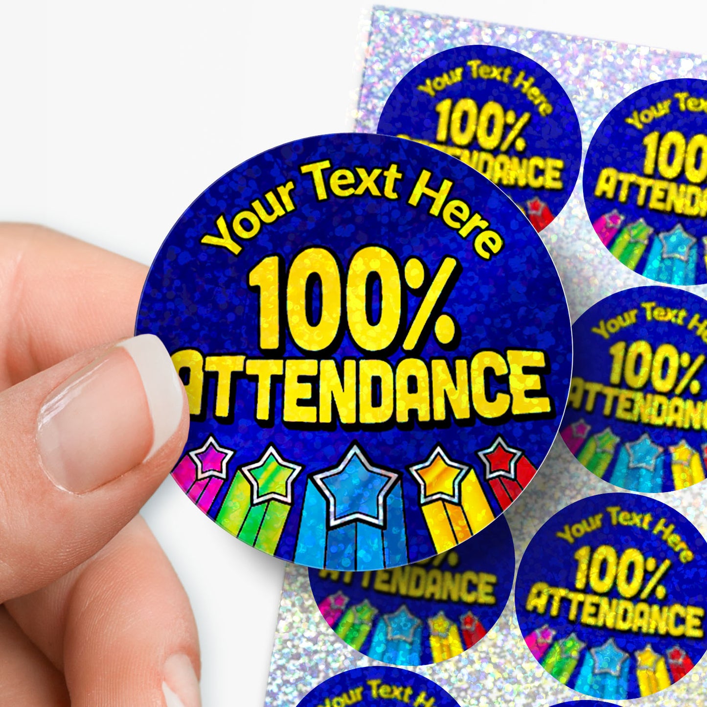 Personalised holographic colorful '100% Attendance' stickers with customisable text held by a hand.
