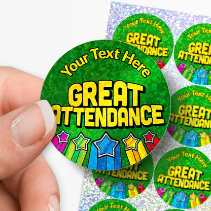 Circular personalised holographic stickers with 'Great Attendance' text and colorful stars, held by a hand.