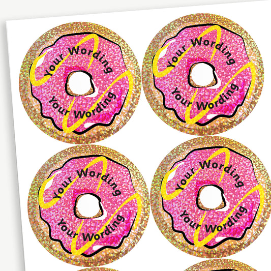 A sheet of customisable circular stickers featuring a holographic background of a pink iced ring doughnut.  Placeholder text 'Your Wording' arcs above and below the image for customisation.