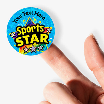 Colorful 'Sports Star' badge held by a hand on a white background